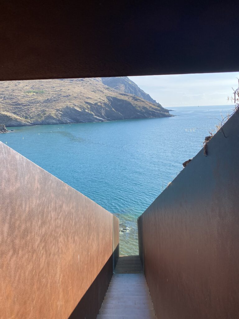 Walter Benajim Memorial in Portbou Spain - a stairway falling into the ocean.